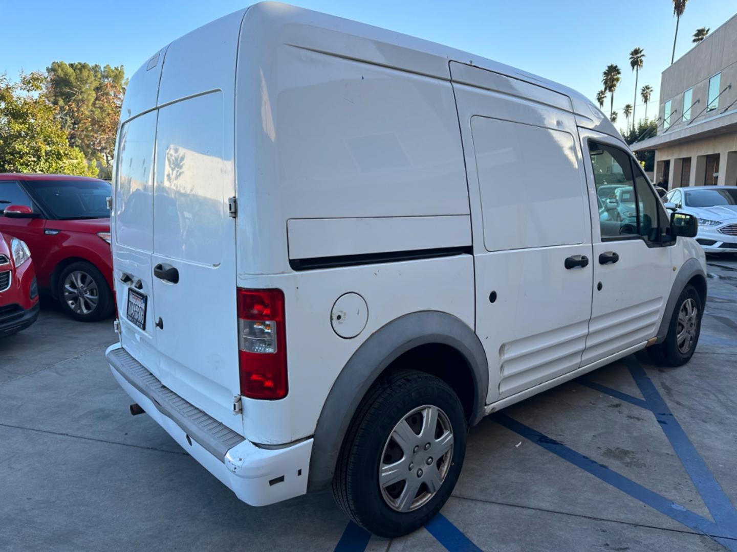 2012 White /Black Ford Transit Connect XLT with Rear Door Glass (NM0LS7BN0CT) with an 2.0L L4 DOHC 16V engine, 4-Speed Automatic transmission, located at 30 S. Berkeley Avenue, Pasadena, CA, 91107, (626) 248-7567, 34.145447, -118.109398 - Great price point for a work van. - Photo#4